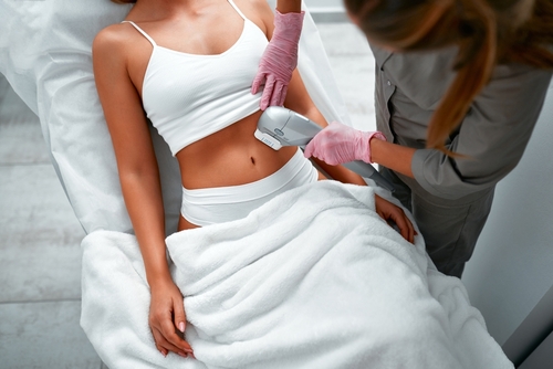 Close,Up,Doctor,Cosmetologist,Using,Ultrasound,Device,While,Performing,Lifting